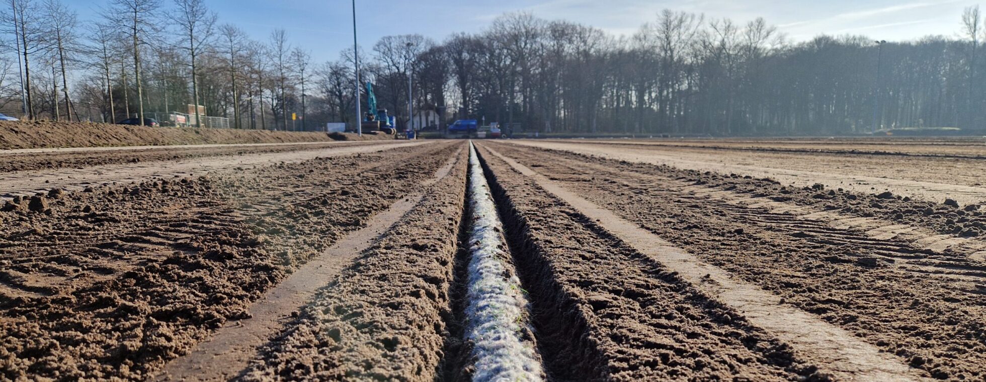 Drainageslang in de onderlaag.